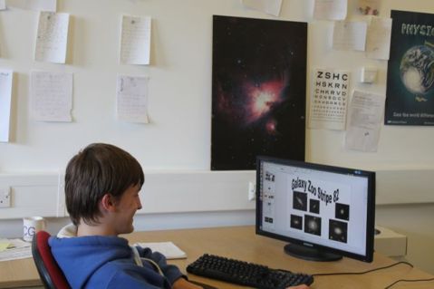 Alex hard at work on his Galaxy Zoo project. 